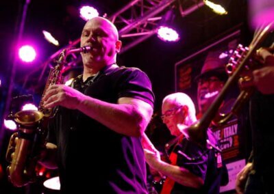 Full horn section in a live show